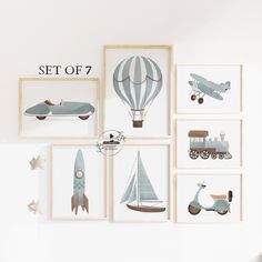 a set of 7 framed pictures with different types of vehicles and planes on them, all in various shapes and sizes