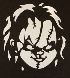 a black and white drawing of a clown's face