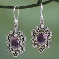 Caught in the intricate embrace of sterling silver ropes, amethyst reveals a vibrant purple hue. Neeru Goel presents handcrafted earrings with modern Indian style. Purple Sterling Silver Jewelry With Intricate Design, Sterling Silver Purple Jewelry With Intricate Design, Sterling Silver Jewelry With Intricate Design In Purple, Ornate Purple Sterling Silver Earrings, Purple Sterling Silver Filigree Jewelry, Ornate Purple Drop Earrings, Ornate Purple Dangle Earrings, Ornate Sterling Silver Purple Jewelry, Ornate Purple Sterling Silver Jewelry