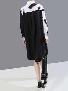 Sku CY-!64478 Material Polyester Style Loose , Long Sleeves Feature Printing , Split-joint Neckline Lapel Occasion Urban , Original Creation Seasons Spring , Autumn Type Midi Dresses Color BLACK WHITE Size FREE SIZE Model's weight: 49kg Model's height: 168cm(66.14inches) Model's bust: 86cm(33.86inches) Model's waist:66cm(25.98inches) Please consult the size chart we provide for this item's measurements to help you decide which size to buy.Please note: There may be 1-3cm differ due to manual measurement. size Bust Waist Shoulder Sleeve Length FREE SIZE 43.31 47.24 17.72 21.26 38.19 Black Long Sleeve Oversized Midi Dress, Black Oversized Long Sleeve Midi Dress, Black Shift Midi Dress For Fall, Black Shift Midi Dress For Spring, Black Shift Midi Dress Knee-length, Black And White Long Sleeve Dresses For Work, Black And White Knee-length Midi Dress For Spring, Sleeve Midi Dress, Midi Dress With Sleeves