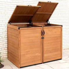 an outdoor storage box with two open doors