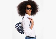 Taking inspiration from the '90s (when the original Sam bag debuted!) our Sam Icon crossbody is a sleek revamp of a perennial crowd favorite. Updated with convertible straps it's crafted in patent Saffiano leather for a cool modern look. | Kate Spade Sam Icon Daisy Dot Small Convertible Crossbody, Parisian Navy Modern Kate Spade Bags For Spring, Chic Kate Spade Shoulder Bag For Spring, Kate Spade Spring Evening Shoulder Bag, Kate Spade Evening Shoulder Bag For Spring, Kate Spade Spring Crossbody Shoulder Bag, Kate Spade Crossbody Shoulder Bag For Spring, Kate Spade Shoulder Bag With Adjustable Strap For Spring, Chic Kate Spade Bags For Spring, Kate Spade Summer Travel Shoulder Bag