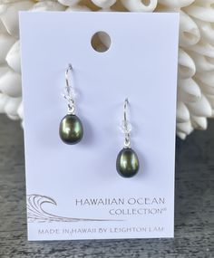 A classic freshwater pearl earring to accentuate your style. We match each pearl by hand, but just like you, each pearl is unique. Length: 0.6" Materials: 9mm Freshwater Pearl. Czech Fire Polish Bead. Sterling silver ear wires. Collection: Hawaiian Ocean Collection Hawaiian Ocean, Ocean Collection, Freshwater Pearl Earrings, Freshwater Pearls Earrings, Pearl Earring, Large Earrings, Ear Jewelry, Ear Wires, Fresh Water