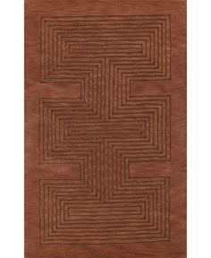 a brown rug with an intricate design on it