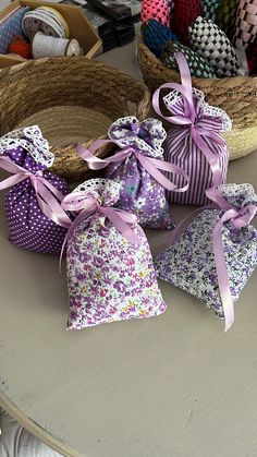 several small bags are sitting on a table