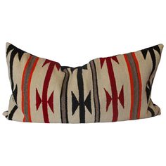 a decorative pillow with an arrow design on it