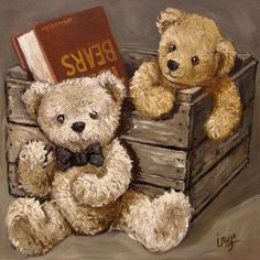 two teddy bears sitting on top of a wooden crate with a book in its lap