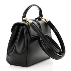 This is an authentic CELINE Satinated Calfskin Mini 16 Top Handle Bag in Black. This bag is crafted of polished calfskin leather. It features a top handle, an optional shoulder strap with polished gold hardware. The bag opens with a twist-lock to a partitioned black leather interior with a zipper compartment and patch pockets. Dior Jewelry, Oversized Bag, Versace Bags, Celine Bag, Wallet Fashion, Hobo Handbags, Luxury Accessories, Handle Bag, Leather Interior