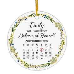 a personalized ornament for the month of november, with an image of a wreath