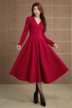 This red wool dress is very elegant. You will be the center of everyone's attention when you wear it! Crafted from smooth wool fabric, this red dress has a delightful V-neckline and long sleeves. You won't want to take it off when you put it on, and it's perfect to wear on some important festivals like Christmas! DETAIL * 30% wool, 30% fiber, 40% polyester * fully satiny lining, more nice to the touch body * V neck dress * Two side seam pockets * Right zipper closure * Long sleeves dress * Fit and flare dress * Mid-calf length dress * Swing wool dress * Perfect for autumn, winter * This belt is not for sale * Lean More about the items From the FAQs on the page bottom MODEL SIZE Bust 85 cm(33.4") Waist 67 cm(26.7") Height 168cm (5' 6") She wears size XS Choose CUSTOM Order if you * Need a b