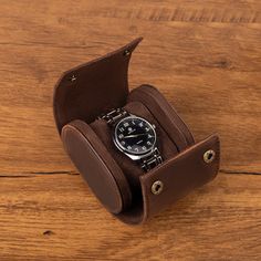 Customized Watches Cases Watch Case Watch Box for Men Watch Storage Case Protective Watch Holder Groom Gift  ◾PRODUCT INFORMATION --------------------------------------------- --Product Size: (L x W x H) - 8.6cm * 7cm * 9.6cm - 3.4×2.8×3.8 in --Item Weight: 0.3 kg --Color: Brown --High-Quality & Density Stitching This is the perfect watch case you need if you are looking for an elegant accessory to protect your luxury watches. Conceived in the finest leather and coming with high-end microfibre lining that keeps your watches as new, this watch case for travel is an absolute must-have. There is a removable cushions inside, that make it easy to install and remove your watches in this watch holder for men. This leather watch case holder is absolutely customisable and is available in a fantasti Classic Brown Watch With Round Case, Gift Brown Leather Strap Watches, Brown Leather Strap Watch As Gift, Gift Watches With Leather Strap And Round Case, Leather Watches With Round Case For Gift, Rectangular Leather Watch For Gift, Leather Watches With Round Case As Gift, Rectangular Leather Watch As A Gift, Leather Watches With Round Case