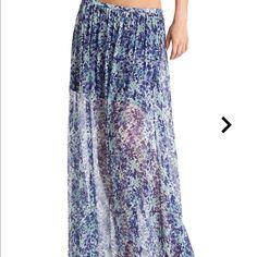 Style: #P21d2202000 Capture Two Of-The-Moment Trends In This Floral Maxi Skirt. Its Chic Length And Eye-Catching Pattern Keep Your Style Current And Ready For Summer. Maxi Skirt Sheer Floral Pattern Miniskirt Length Lining Hidden Zipper Closure At Side Measures 40” Length From Waist To Hem 100% Viscose. Lining: 96% Polyester, 4% Spandex. Dry Clean Note: Tags Have Been Cut Through To Prevent Store Returns Chic Blue Maxi Skirt With Floral Print, Blue Spring Maxi Skirt, Blue Maxi Skirt For Spring And Summer, Spring Blue Flowy Maxi Skirt, Blue Flowy Maxi Skirt For Day Out, Blue Maxi Skirt For Spring Day Out, Blue Maxi Skirt With Elastic Waistband For Vacation, Blue High-waist Floral Print Skirt, Blue Floral Print Long Skirt