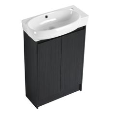 a white sink sitting next to a black cabinet