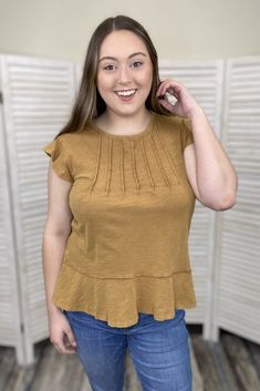 The My Personality Top By Doe & Rae is a washed extended ruffle sleeve tee featuring pintuck detail and a round neckline. 100% Cotton Bust: Size M- 19'' Length: Size M- 25'' True To Size S 0-6 M 6-10 L 10-14 Solid Flutter Sleeve Tops For Fall, Fall Solid Color Tops With Flutter Sleeves, Solid Color Flutter Sleeve Tops For Fall, Solid Casual T-shirt With Flutter Sleeves, Fall Flutter Sleeve Solid Tops, Casual Cotton Short Sleeve Top With Ruffle Sleeve, Casual Cotton Short Sleeve Top With Ruffle, Casual Cotton Ruffle Sleeve Top, Casual Ruffled T-shirt For Fall