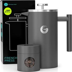 the french press coffee maker is next to its box