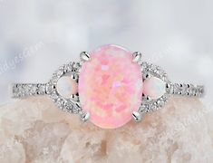 Pink Fire Opal Engagement Ring, Elegant Pink Opal Oval Jewelry, Pink Opal Ring Fine Jewelry, Pink Opal Ring With Accent Stones As Gift, Elegant Pink Opal Ring, Elegant Oval Pink Opal Ring, Anniversary Pink Opal Oval Ring, Elegant Pink Opal Gemstone Ring, Oval Pink Opal Ring Gift