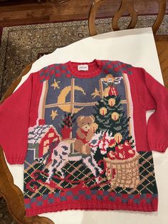 an ugly sweater is sitting on the table