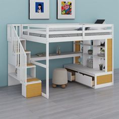 there is a loft bed with stairs and desk underneath it in the room that has blue walls