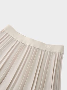 Our Merino Pleated Skirt-Ivory is the perfect addition to your wardrobe. Offering both comfort and style, it is a versatile piece that can easily be dressed up or down for any occasion. Chic Beige Stretch Pleated Skirt, Chic Stretch Beige Pleated Skirt, Elegant Beige Tiered Skirt Bottoms, Elegant Beige Tiered Mini Skirt, Elegant Beige Stretch Maxi Skirt, Relaxed Neutral Maxi Skirt, Neutral Flowy Lined Skirt, Cream Lined Feminine Mini Skirt, Stretch Beige Pleated Maxi Skirt