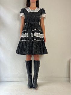 "- Vintage handmade black polka dot puff sleeve dress - Zipper up the back - Lace trim - No tags - Small  Bust: 17.5\" Waist: 14\" Length: 38\"" Fitted Swiss Dot Knee-length Dresses, Fitted Knee-length Dresses With Swiss Dot, Fitted Knee-length Swiss Dot Dresses, Vintage Mini Dress In Polka Dot, Fitted Swiss Dot Dress With Puff Sleeves, Black Ruffled Retro Dress, Fitted Polka Dot Dress With Lace Trim, Black Fitted Swiss Dot Dress, Fitted Black Swiss Dot Dress