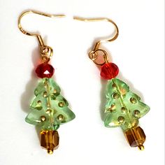 Handmade Christmas Tree Earrings Made By Me In Birmingham Alabama. I Have Used Swarovski Crystal Amber Ab Coated Aurora Borealis Tree Trunk, A Glass Green Clear Tree With Ab On One Side Just Green Glass Like The Rest Of It On The Other Side, It's A Very Subtle Coating, I Also Hand Painted The Little Bumps That Were Meant For The Ball Ornaments, They Were Just Plain Same As The Green Tree, So I Painted Gold On Them On Both Sides, Then On Tip Is A Red Faceted Glass Crystal Ball For The Topper, The Real Gold Hoop Earrings, Mickey Earrings, Jewelry Christmas Tree, Mixed Metal Earrings, Bamboo Earrings, Handmade Christmas Tree, Tree Earrings, Christmas Tree Earrings, Birmingham Alabama