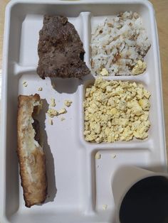 a plastic tray filled with different types of food