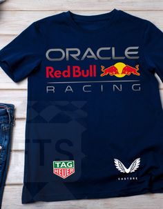 Formula 1 themed Red Bull  t-shirt for any formula one or grand prix fan. QUALITY This T-shirt is a UNISEX t-shirt with a Red Bull  illustration and it feels soft and light, with just the right amount of stretch. It features a crew neck, pre-shrunk fabric and side-seamed fit. FIND YOUR SIZE Please find the fitting guide in the pictures to determine your size. Pro Tip: Choose the best size by comparing the measurements of your favorite T-Shirt with the ones listed on the chart. SHIPPING Each item is made to order and it usually takes 2-3 days to make and ship. During busy times we may add a couple of days to our processing times. REFUNDS & EXCHANGES We offer returns and exchanges, if there's something wrong with your order, please drop us a message and we will do all we can to find the best Casual Short Sleeve T-shirt For Motorsport Events, Red Crew Neck T-shirt For Team Events, Racing Style T-shirt With Letter Print And Crew Neck, Red Casual T-shirt For Team Events, Casual Red T-shirt For Team Events, Racing Style Crew Neck T-shirt For Motorsport Events, Casual T-shirt With Letter Print For Motorsport Events, Casual Crew Neck Tops For Motorsport Events, Racing Style Cotton T-shirt With Letter Print