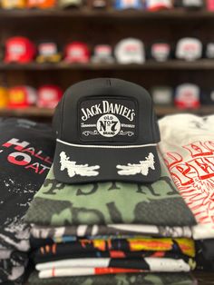 Classic Jack Daniels graphic trucker hat Adjustable snap back One size fits most Curved, moldable bill Black Trucker Hat With Letter Print And Flat Bill, Trucker Baseball Cap With Flat Brim For Streetwear, Casual Adjustable Trucker Hat With Graphic Print, Black Snapback Baseball Cap With Letter Print, Urban Black Snapback Hat With Letter Print, Trendy Black Flat Bill Trucker Hat, Black Flat Brim Trucker Hat For Streetwear, Hip Hop Trucker Hat With Graphic Print For Streetwear, Urban Black Trucker Hat With Letter Print