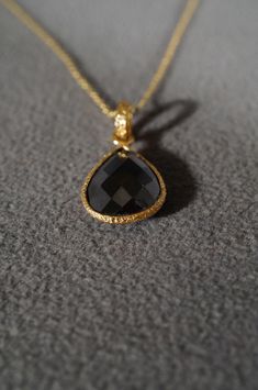 I am offering you this fabulous vintage sterling silver, with yellow gold overlay (stamped) classic bold design lavaliere Pendant Charm style necklace chain . It is a bold wonderful wide design that has such movement and flexibility to it , and such a gorgeous design. Just look at the large domed fancy faceted tear drop / pear shaped hematite, stone, all bezel set creating this large domed oblong shaped dangle pendant charm lavaliere section of this necklace, creating a wonderful shapegiving thi Gold Gemstone Necklace For Evening, Gold Briolette Necklaces For Parties, Exquisite Teardrop Gold Necklace, Exquisite Gold Teardrop Pendant Necklace, Gold Teardrop Evening Necklaces, Elegant Faceted Pear-shaped Necklace, Elegant Engraved Drop Jewelry, Elegant Pear-shaped Faceted Necklace, Exquisite Gold Pear-shaped Necklace