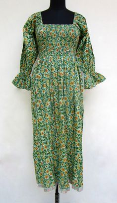 "ITEM DESCRIPTION nature green floral printed cotton long maxi dress - square neckline with smocked maxi dress - long sleeve maxi dress Features: Long sleeve, square neck, Long dress Material: Cotton cambric Fabric: 100% cotton soft light weight ethnic print fabrics  Sleeve Length = 22 inch For more sizes & their measurement, please refer our below chart to understand the sizes variations available with us For your size requirement, please mention your size in seller note at the time of buying. SIZE MEASUREMENT  BUSTLENGTHSHOULDER XXS34 inch51 inch13.5 inch XS36 inch51 inch14 inch S38 inch51 inch14.5 inch M40 inch51 inch15 inch L42 inch51 inch16 inch XL44 inch51 inch16.5 inch 2XL46 inch51 inch17 inch 3XL48 inch51 inch18 inch   Company Return Policy:  Please write for more information to my Green Floral Print Long Sleeve Maxi Dress, Long Sleeve Green Maxi Dress With Floral Print, Green Long Sleeve Maxi Dress With Floral Print, Green Maxi Dress With Smocked Bodice For Spring, Green Midi Smocked Dress With Smocked Cuffs, Green Spring Dress With Elastic Sleeves, Spring Green Dress With Elastic Sleeves, Green Maxi Dress With Smocked Back, Bohemian Smocked Dress With Gathered Sleeves