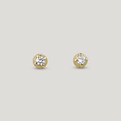 The Blossom Studs – A single gemstone unfolding from a tapered floret of solid gold. Expanding, blooming, becoming something more. Simple forms evoking humble expansion. Certified recycled 14k yellow gold Stud approximately 5mm at the base, 3mm at the top, and 3mm tall White Diamond, 3mm, round brilliant, 0.11ct, G-H, VS-SI, reclaimed Sold as singles or a pair with butterfly earring backs Timeless Gold Jewelry With Tension Setting, Yellow Gold Jewelry With Single Diamond, Timeless Yellow Gold Jewelry With Tension Setting, Timeless 14k Gold Jewelry With Tension Setting, 14k Gold Earrings With Tension Setting For Anniversary, 14k Gold Tension Setting Earrings For Anniversary, Classic Yellow Gold Jewelry With Tension Setting, 14k Gold Jewelry With Diamond White Tension Setting, Formal Yellow Gold Jewelry With Tension Setting