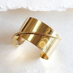 "2.5\" Wide cuff bangle bracelet handcrafted solid brass. High quality Logo Engraved Solid Brass Adjustable Arrives in logo drawstring protective pouch" Wire Cuff, Cuff Bangle Bracelet, In Logo, Quality Logo, Minimal Modern, Wide Cuff, Cuff Bangles, Bangle Bracelet, Cuff Bracelet