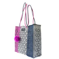 Being 100% handcrafted by artisans in Mexico, the Bloom Woven Tote Bag is stylish, lightweight, and eco-friendly. Crafted from ethically sourced high-quality materials, this bag is your picture-perfect companion for every occasion and will turn out to be your favorite accessory for years to come. The gorgeous design, perfect size, and durable construction make it a must-have for every closet. Environment-friendly, elegant, and functional, it doesn’t get better than this! Our redesigned totes now Casual Travel Shoulder Bag Made Of Recycled Materials, Casual Beach Bag Made From Recycled Materials, Summer Travel Bags Made Of Recycled Materials, Black Recyclable Summer Bags, Casual Summer Bags Made From Recycled Materials, Casual Travel Bag Made Of Recycled Materials, Casual Travel Bag Made From Recycled Materials, Rectangular Reusable Beach Bag For Travel, Reusable Rectangular Beach Bag For Travel