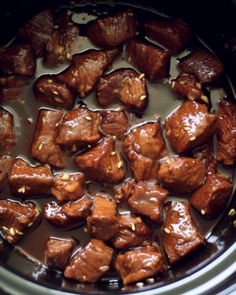 the food is being cooked in the slow cooker