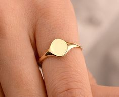 Our circle disc ring is made of 14k solid gold. It fits your all outfit at any time of the day with its minimalist and dainty style. Also, it can be used as a joint ring. You can enter the name, initial, date, or whatever you want on the personalization box. Your name is engraved with a special laser. ( You can see the example of a ring that is engraved with a special laser in the photos.) If you consider it as a gift for special days, it will a perfect choice for your loved ones on their birthd Stackable Initial Ring, Modern Engraved Gold Ring, Minimalist Rose Gold Signet Ring With Polished Finish, Minimalist Rose Gold Polished Signet Ring, Modern Engraved Stackable Round Ring, Everyday Tarnish Resistant Engraved Ring, Everyday Tarnish-resistant Engraved Ring, Fine Jewelry Everyday Initial Ring, Simple Stackable Initial Ring