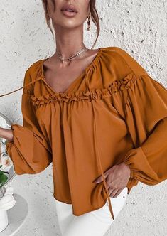 The EMES SHOP blouse is detailed with cute ruffle details. Features a tie neck. drop shoulder. solid color. and flowy fit. Pair it with palazzo pants and sunnies for a fantastic look.MATERIAL:100%Soft Poly MEASUREMENTS:Product Length 24"-26"in Small | Bust & Hem Width : 39"-41"in Medium| Bust & Hem Width : 41"-43"in Large| Bust & Hem Width : 43"-45"in X Large| Bust & Hem Width : 45"-47"in MEASUREMENTS:Product Length 60"-65"cm Small | Bust & Hem Width : 99"-104"cm Medium| Bust & Hem Width :104"-1 Large Bust, Palazzo Pants, Tie Neck, Small Bust, Shop Blouses, Drop Shoulder, Neck Tie, Sunnies, Bell Sleeve Top