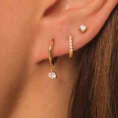 Dainty Everyday Earring Gift Set DETAILS: * Sterling Silver & 18K Gold Vermeil (strong plating over sterling silver) * A (hoop) - inner diameter - 9mm, length - 18mm * B (pave hoop) - inner diameter - 7mm * C (stud) - 3mm with butterfly backings * Nickel and lead free * Waterproof  * Tarnish resistant  * Hypoallergenic  * Lightweight * Can be worn 24/7 Each design sold as a pair (2 earrings) All earrings: https://www.etsy.com/shop/KaterynasJewelry?search_query=earrings Earring Sets For 2 Piercings, Earring Ear Ideas, Ear With 3 Piercings, Earring Stack Sets, 3 Hoops Earrings, 3 Pair Earring Set, 3 Rd Piercing, 4 Earrings In One Ear, Solid Gold Earring Stack