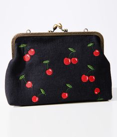 This adorable 1950s accessory features intricate cherry embroidery on a classic black fabric, giving it a retro and fun vibe. The polka dot print lining inside adds an extra touch of charm while keeping all your essentials organized. With a convenient kiss lock closure, removable hand strap, and chain strap, this versatile handbag can be worn multiple ways to suit your style. Plus, the interior zipper pocket ensures you have a secure spot for your belongings.Available while supplies last. Fashion Lessons, 1950s Accessories, Monday Fashion, Cherry Embroidery, Unique Handbags, Hand Strap, Vintage Purses, Black Cherry, Polka Dot Print