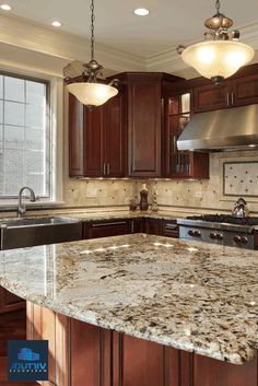 a kitchen with granite counter tops and wooden cabinets