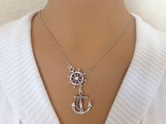 "Anchor and Wheel Lariat style silver plated Necklace with 18\" Chain with barrel clasp for closure. on Wheel its says \"LOVE\" All Navy People Really Love this Approximate Charm Size Anchor - 1 inch Wheel - 1 inch Charm Material - Plated Hand made by me" Nickel-free Metal Lariat Necklace Gift, Sterling Silver Lariat Necklace With Lobster Clasp As Gift, Personalized Silver Lariat Necklace, Silver Plated Necklace, Made By Me, Necklace Etsy, Silver Plate, 1 Inch, Silver Plated