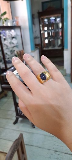 This Ring in 18k Gold with an Iolite makes a beautiful addition to any jewelry collection. The warm color of the 18k gold holds the mesmerizing Iolite for a stunning contrast. A true show stopper, this beautiful and unique ring is sure to turn heads. Luxury Tanzanite Yellow Gold Ring, Yellow Gold Tanzanite Rings, Yellow Gold Tanzanite Ring With Polished Finish, Luxury Yellow Gold Tanzanite Ring, Gold Tanzanite Gemstone Rings, Gold Tanzanite Oval Ring, Yellow Gold Tanzanite Gemstone Rings, Tanzanite Gemstone Rings In Yellow Gold, Formal Gold Tanzanite Rings