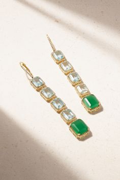 SHAY's 'Portrait' earrings are a modern take on stunning Art Deco styles - an era that inspires so many of the brand's pieces. Cast from 18-karat gold, they're set with four blue topaz stones and one glowing green agate, all framed with a halo of sparkling diamonds. The long, nearly shoulder-grazing length means you don't have to worry about how to style your hair to ensure they're peeking out from underneath. Luxury Earrings With Natural Stones, Luxury Statement Earrings With Stones, Luxury Natural Stone Drop Earrings, Luxury Traditional Multi-stone Earrings, Luxury Green Natural Stone Earrings, Blue Topaz Stone, Topaz Stone, Fine Jewels, Fine Jewellery Earrings