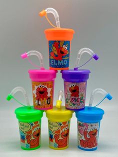 PRICES MAY VARY. 6 - 6oz Cups, 5.5 inches tall, Snap On Lids Assorted Neon Colors You will receive all items Separate in your package Assembly of cups and application of stickers is required 6 assorted “Elmo“ themed stickers Create your own Sipper Cups! 6 Lightweight Party Favor Cups (assorted colors), 6 Stickers, 6 snap on Lids, 6 Straws with caps. Fun DIY (Do It Yourself) Project the kids can join in on. Customize sipper cups with stickers to match your party theme. Assembly of cups and applic Diy Elmo Birthday Party, Elmo Party Favors, Kids Party Cups, Elmo Birthday Party Boy, Party Favor Cups, Elmo Birthday Party, Favor Cups, Bubble Party, Elmo Party