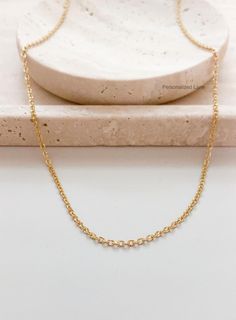 This  listing is for one Dainty Diamond Cut Chain Necklace.  If you need larger quantities, then please let me know! Thank you! Materials: *18K Gold color Stainless Steel *Dainty Diamond Cut Chain: 2.5mm Links *Length: Choose your length from the drop down menu. All orders are shipped Monday-Friday with the exception of holidays. All delivery dates are estimated dates only. There is always the possibility that the shipping carrier may experience delays in delivery.  Due to the nature of the item Minimalist Delicate Chain Necklace As Gift, Minimalist Delicate Chain Necklace For Gifts, Dainty 14k Gold Chain Necklace Gift, Gold Charm Necklaces With Cable Chain For Anniversary, Minimalist Gold Plated Chain Necklace As Gift, 14k Gold Clavicle Chain Necklace Gift, Gold Cable Chain Jewelry Gift For Her, Minimalist Gold Plated Chain Necklace For Gift, Delicate Adjustable Chain Necklace Gift