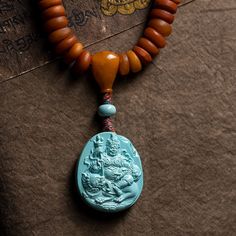 African Amber 108 Mala Beads with Turquoise Carved Jambhala God Of Wealth, 108 Mala Beads, Mala Beads, Turquoise Pendant, Ganesha, Deer, Amber, Carving, Necklaces