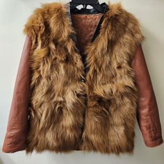 Perfect For Winter. Back: Genuine Leather And Shearling. Front: 100%Polyester Padded With Genuine Fox Fur Fully Covered. Leather Trimmed. Can Be Dressed Up Or Dressed Down. Button Closure. Please Be Careful When Using Bottons. 20" Across Bust Length:26“ Cognac Leather Winter Outerwear, Cognac Leather Outerwear For Winter, Brown Leather Fur Coat For Fall, Brown Leather Fur Coat With Faux Fur Lining, Brown Leather Fur Coat With Faux Fur Trim, Luxury Brown Leather Jacket With Faux Fur Trim, Luxury Brown Leather Jacket With Faux Fur Lining, Luxury Brown Leather Fur Coat, Shearling Coat