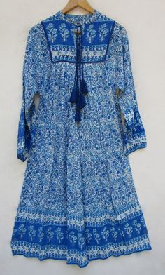 "ITEM DESCRIPTION royal blue floral printed rayon long summer maxi dress | collared neckline with tassel maxi dress | long sleeve bohemian long maxi dress Features : Long sleeve, Collared neck, Long dress Material : Soft rayon crepe fabric sleeve length- 22 inch For more sizes & their measurement, please refer our below chart to understand the sizes variations available with us For your size requirement, please mention your size in seller note at the time of buying. SIZE MEASUREMENT BUSTLENG Blue Floral Print Maxi Dress For Festival, Blue Bohemian Style Maxi Length Boho Dress, Blue Bohemian Maxi Dress With Floral Print, Blue Bohemian Maxi Boho Dress, Light Blue Bohemian Maxi Dress, Long Blue Floral Print Boho Dress, Blue Long Boho Print Dress, Blue Long Boho Dress With Floral Print, Long Blue Boho Print Dress