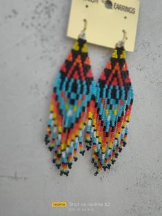 Unique Tiny Beaded Earrings For Festival, Unique Festival Earrings With Tiny Beads, Handmade Teardrop Beaded Festival Earrings, Colorful Beaded Teardrop Earrings For Beach, Handmade Teardrop Beaded Earrings For Festivals, Teardrop Earrings With Colorful Beads For Beach, Teardrop Beach Earrings With Colorful Beads, Beaded Earrings For Festivals, Multicolor Dangle Beads With Ear Wire