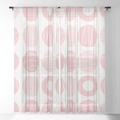 a pink and white polka dot pattern sheer curtain