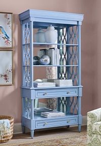 a blue bookcase in the corner of a living room